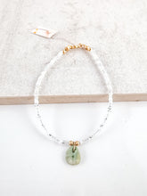 Load image into Gallery viewer, Glass bead bracelet with a green stone pendant
